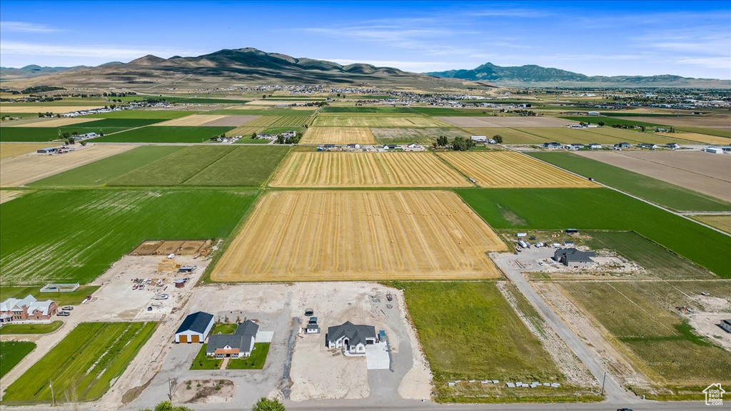 Aerial view featuring a rural view and a mountain view