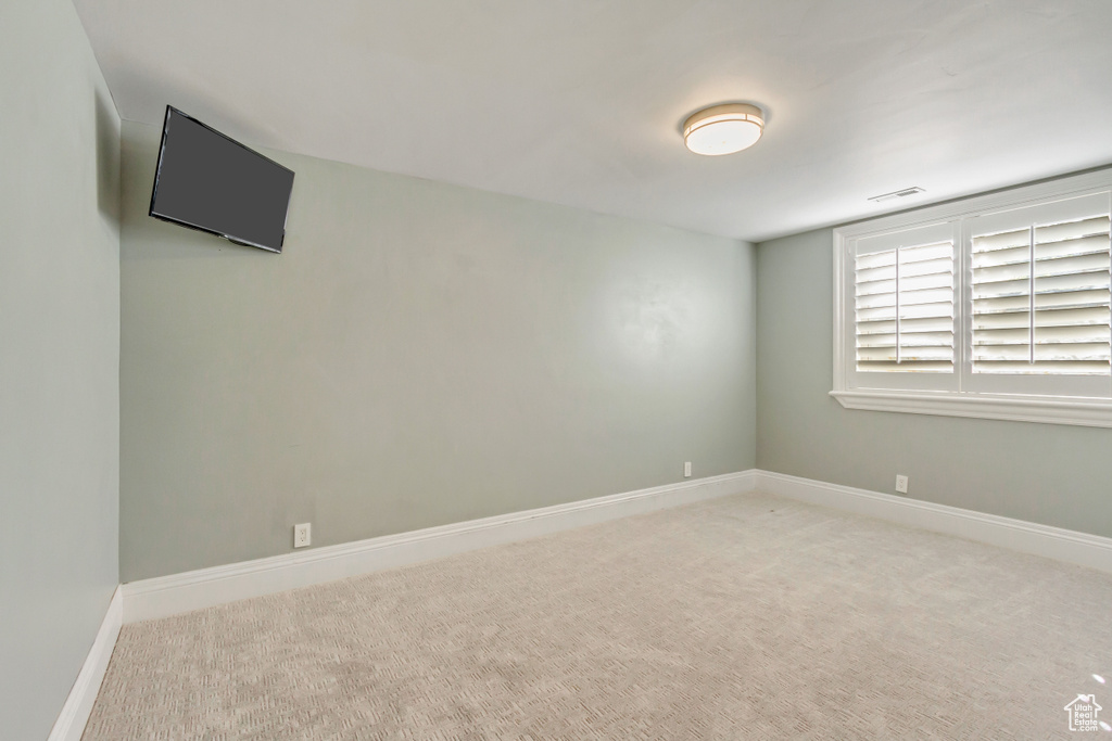 View of carpeted spare room