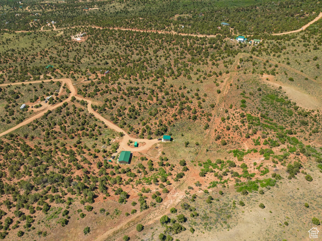 Birds eye view of property with a rural view