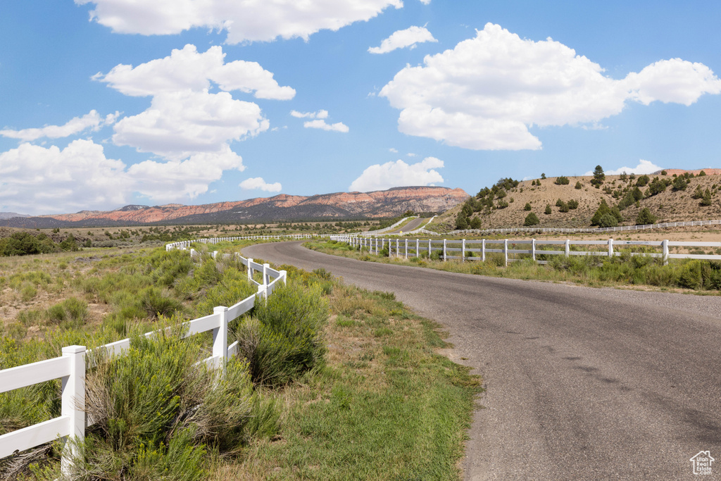 View of street featuring a rural view and a mountain view