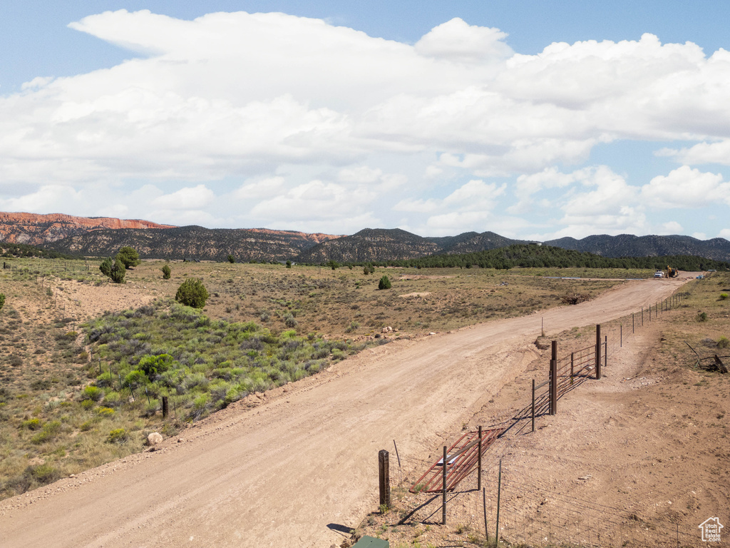 Property view of mountains featuring a rural view