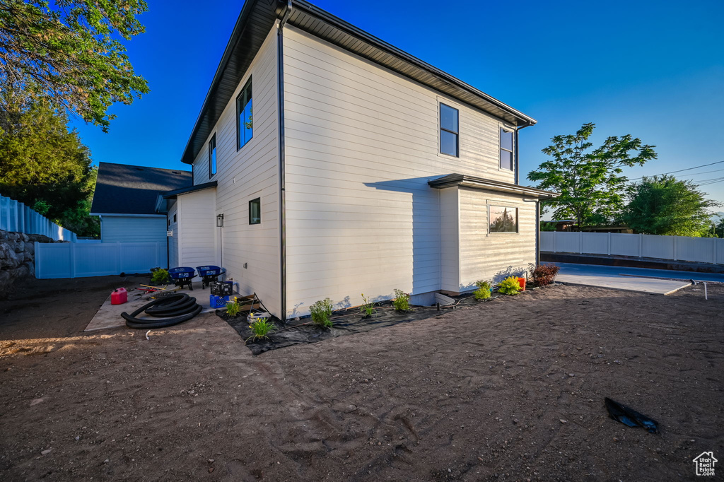 Back of property featuring a patio area