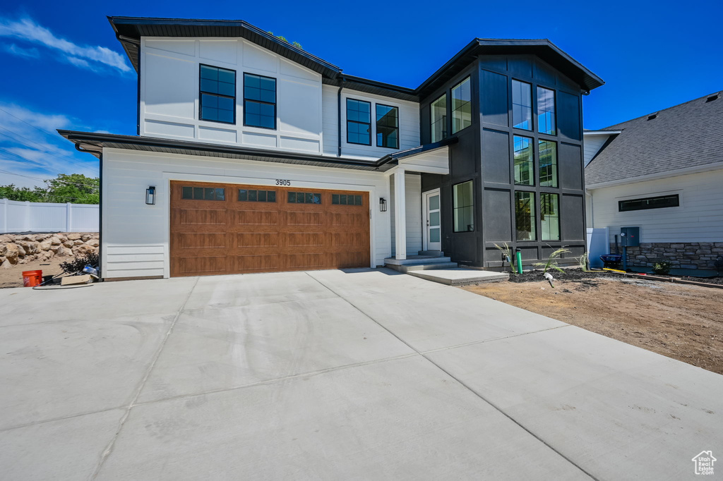 Contemporary house featuring a garage