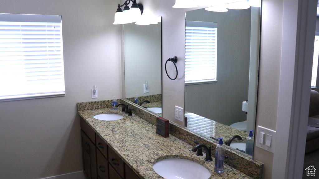 Bathroom featuring dual vanity