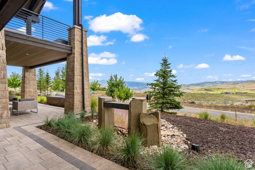 View of terrace featuring a mountain view