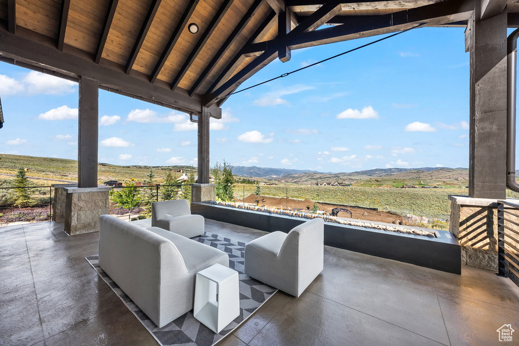 View of terrace with a mountain view and an outdoor living space