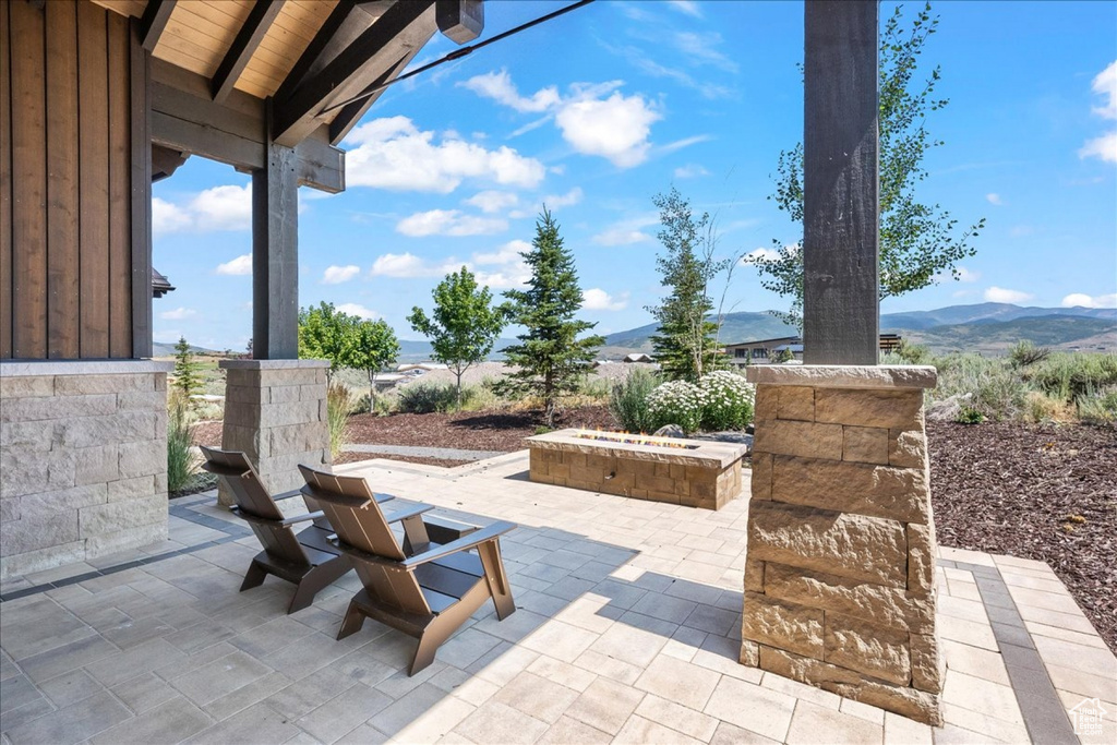 View of patio featuring a mountain view