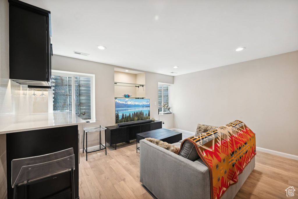 Living room featuring light hardwood / wood-style flooring