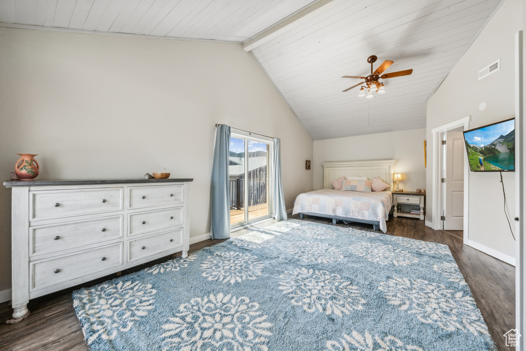 Bedroom with ceiling fan, beamed ceiling, dark hardwood / wood-style flooring, access to outside, and high vaulted ceiling