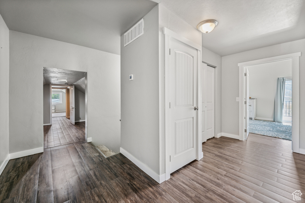 Hall featuring wood-type flooring