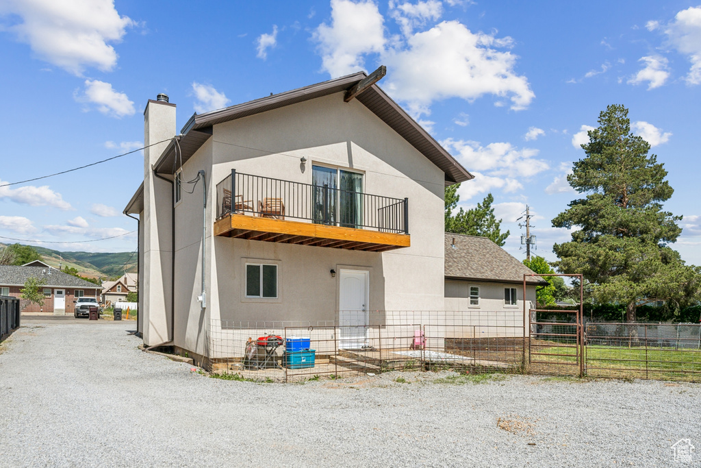 Exterior space featuring a balcony