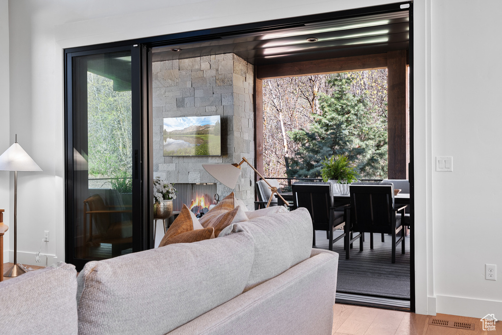 Living room with wood finished floors and baseboards