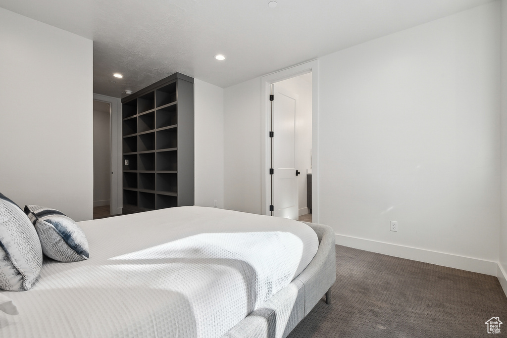 Bedroom featuring carpet floors, baseboards, and recessed lighting