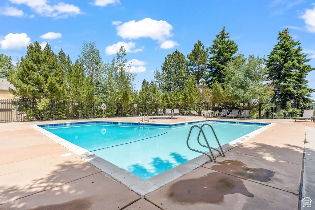 View of pool with a patio area