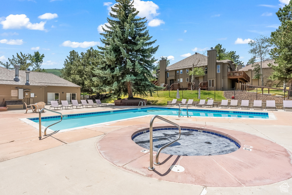 View of pool featuring a patio area