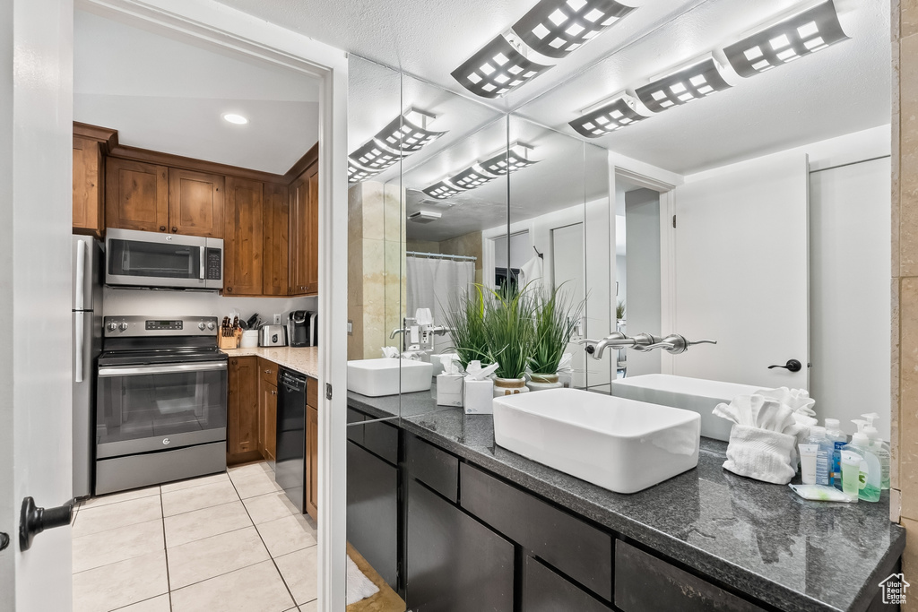 Interior space with tile floors and oversized vanity