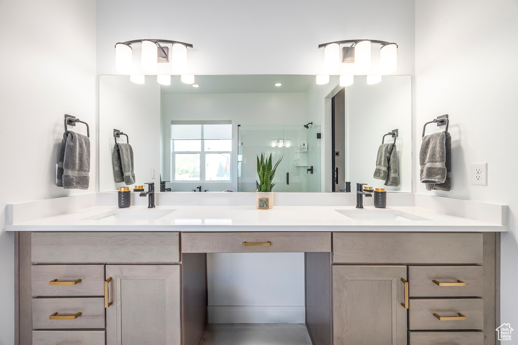 Bathroom featuring dual vanity