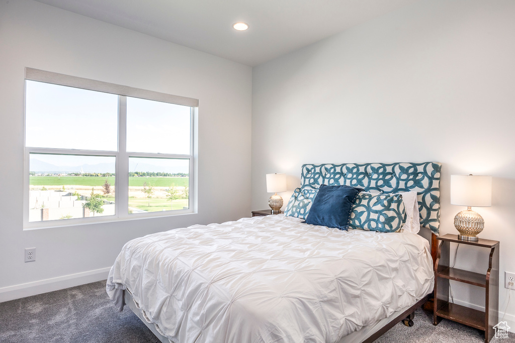 Bedroom featuring carpet flooring