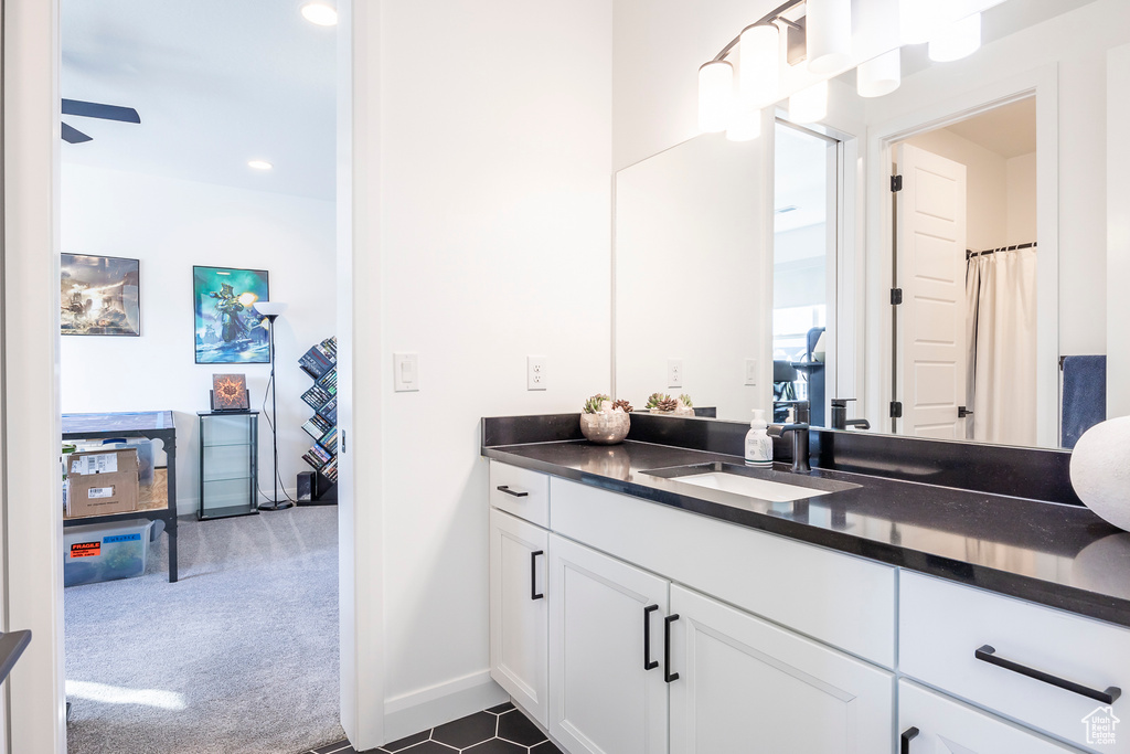 Bathroom with tile floors and vanity