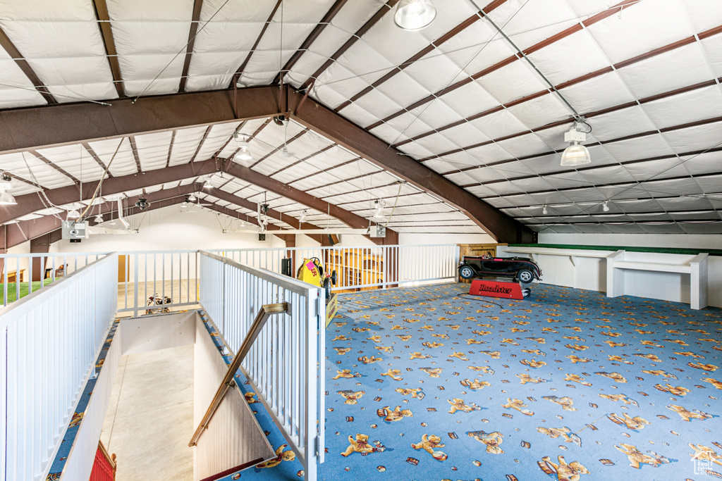 Bonus room with vaulted ceiling and carpet floors