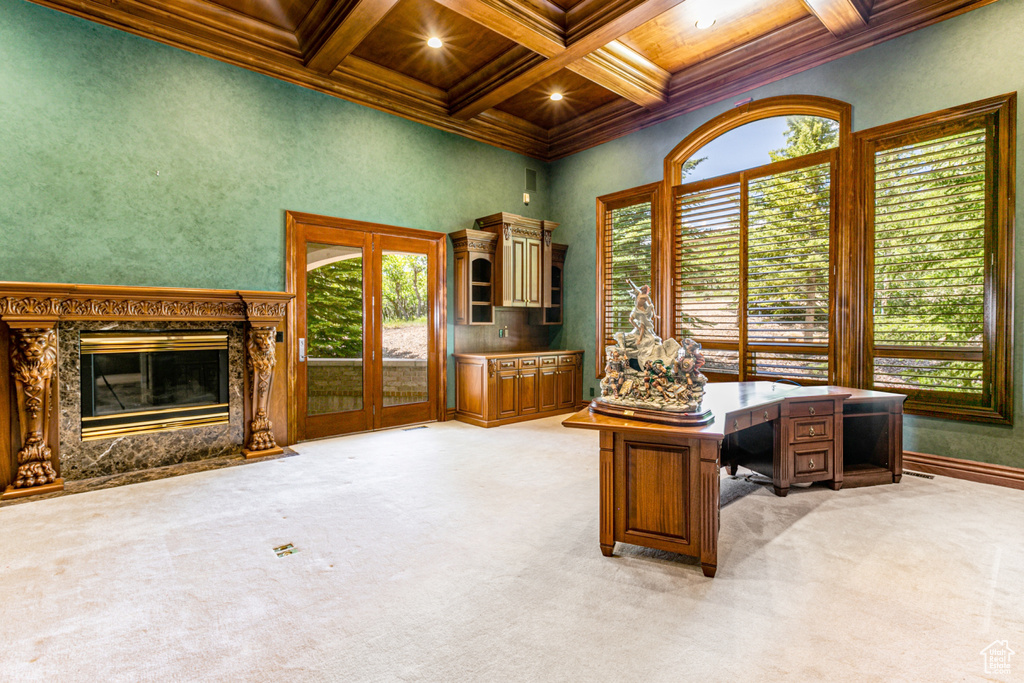 Office space featuring beam ceiling, wooden ceiling, coffered ceiling, and light colored carpet