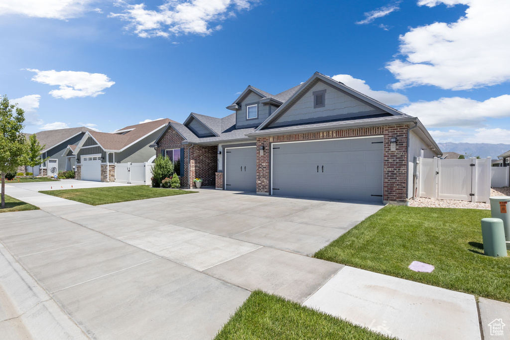 View of front of property with a front lawn