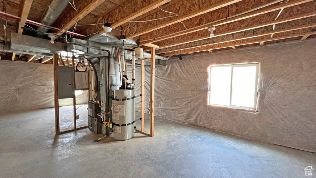 Basement with strapped water heater