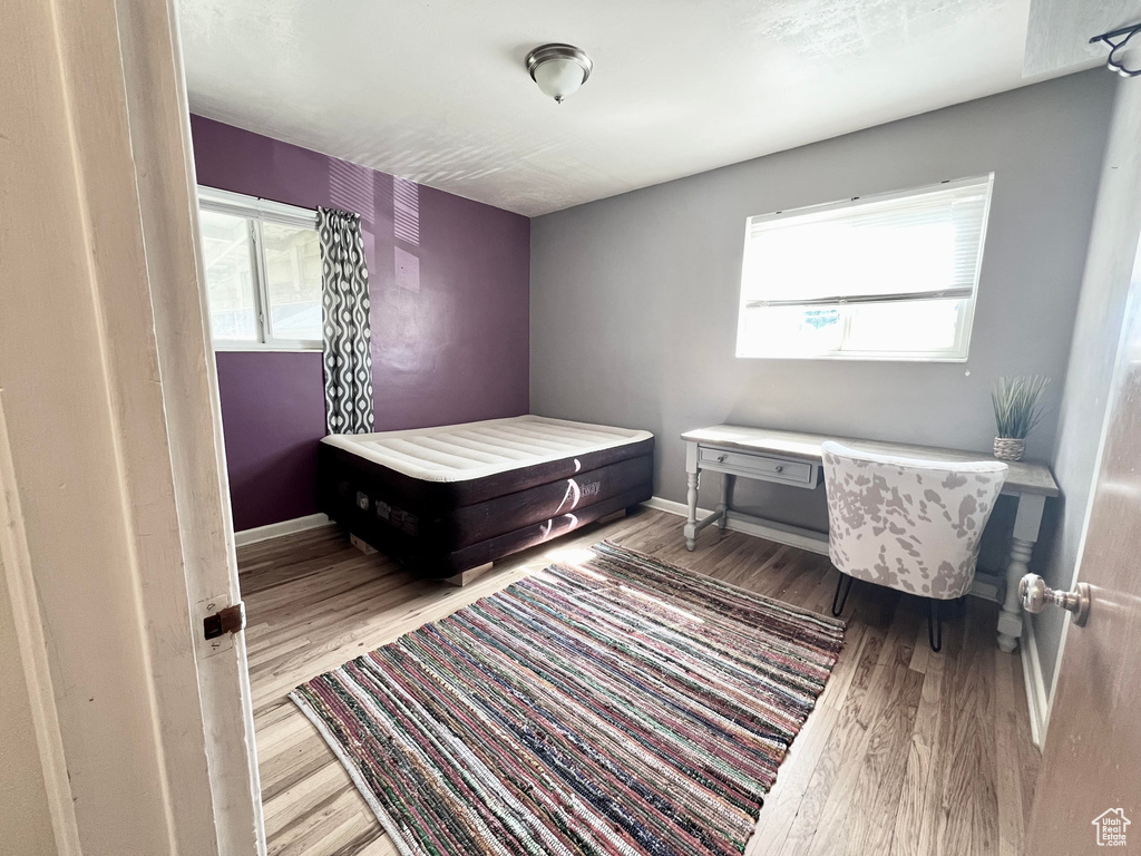 Bedroom featuring hardwood / wood-style flooring