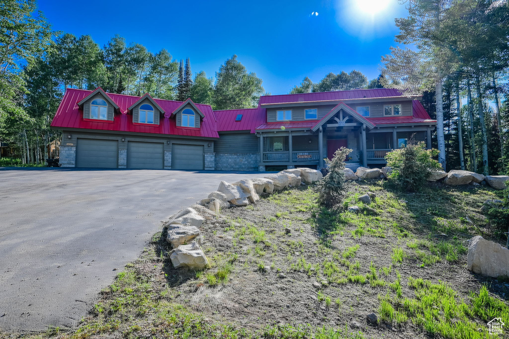 View of front facade featuring a garage