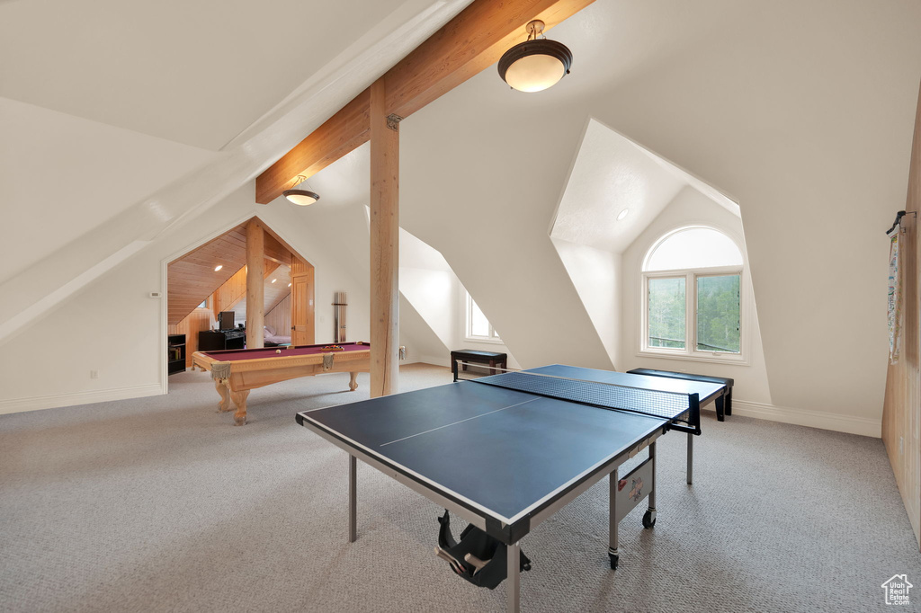 Game room with vaulted ceiling with beams, carpet, and pool table