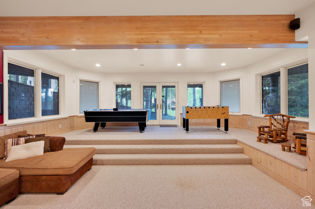 Game room featuring beam ceiling, billiards, french doors, and carpet floors