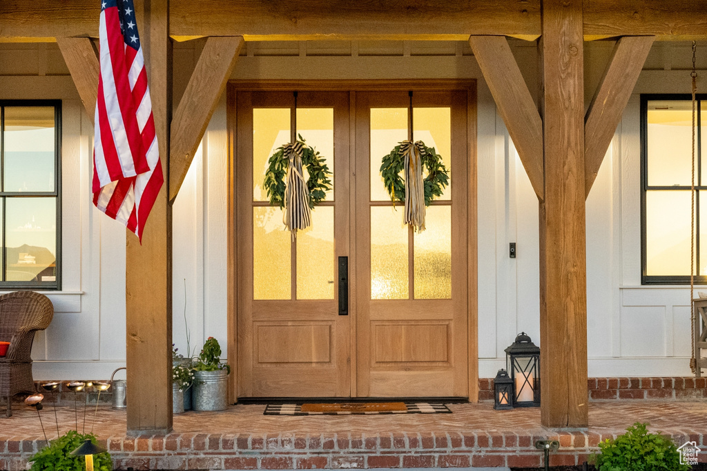 Entrance to property featuring french doors