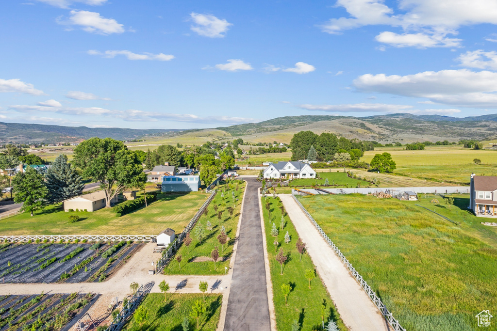 Drone / aerial view featuring a mountain view and a rural view