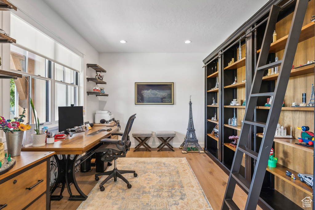 Office space featuring light wood-type flooring