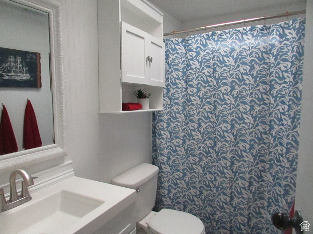 Bathroom with vanity and toilet