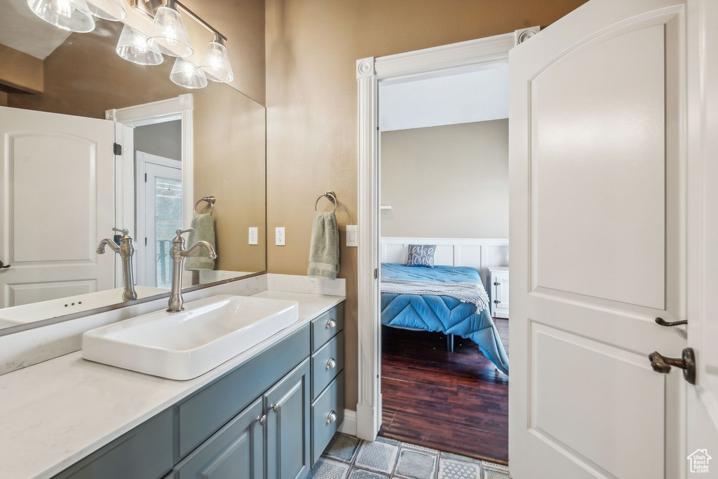 Bathroom with vanity and tile patterned floors