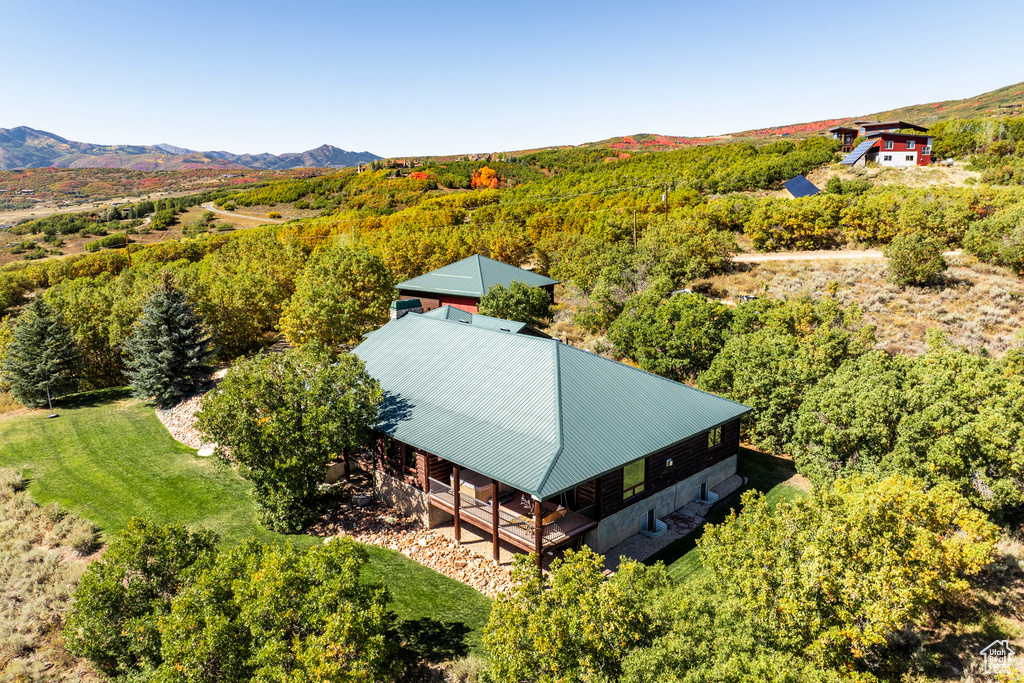 Birds eye view of property featuring a mountain view