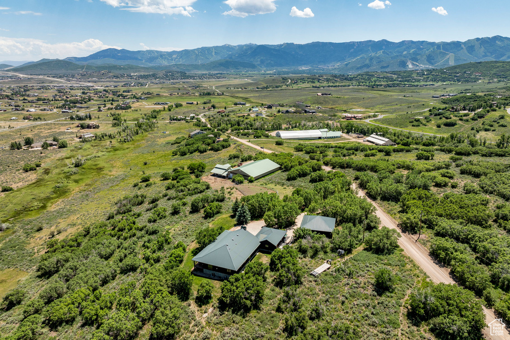 Birds eye view of property featuring a mountain view