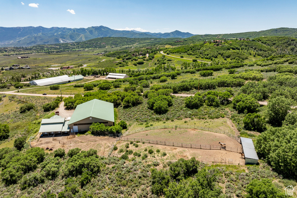 Birds eye view of property featuring a mountain view