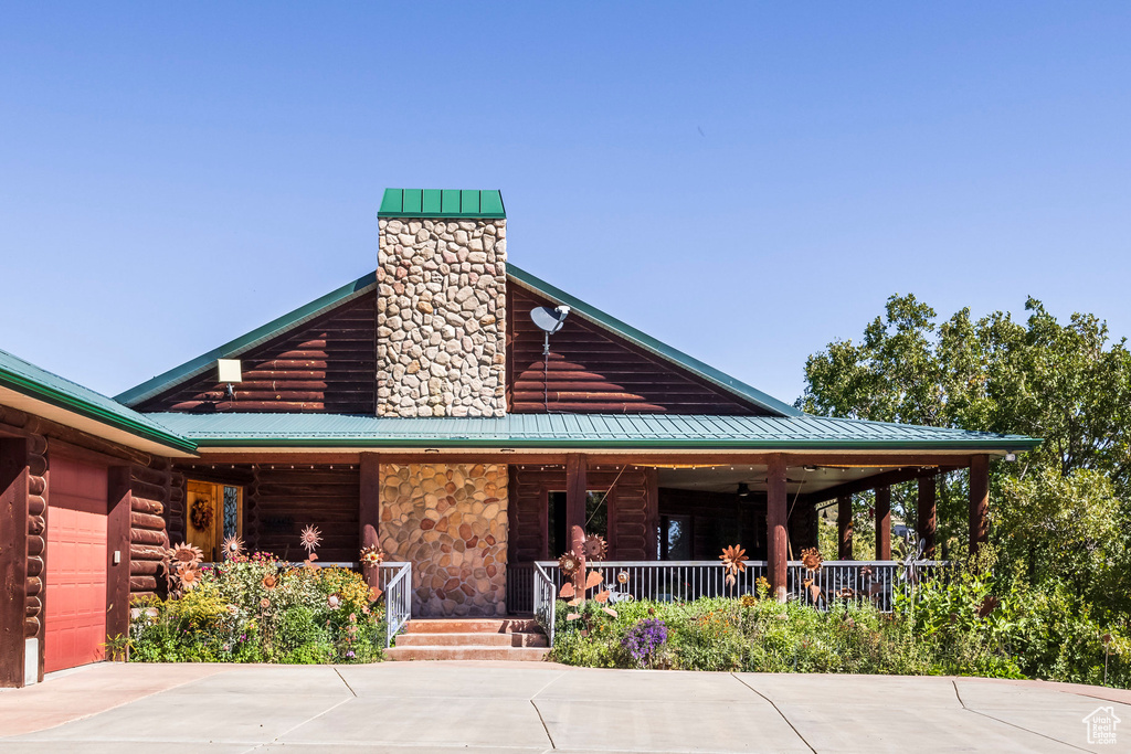 Exterior space featuring covered porch