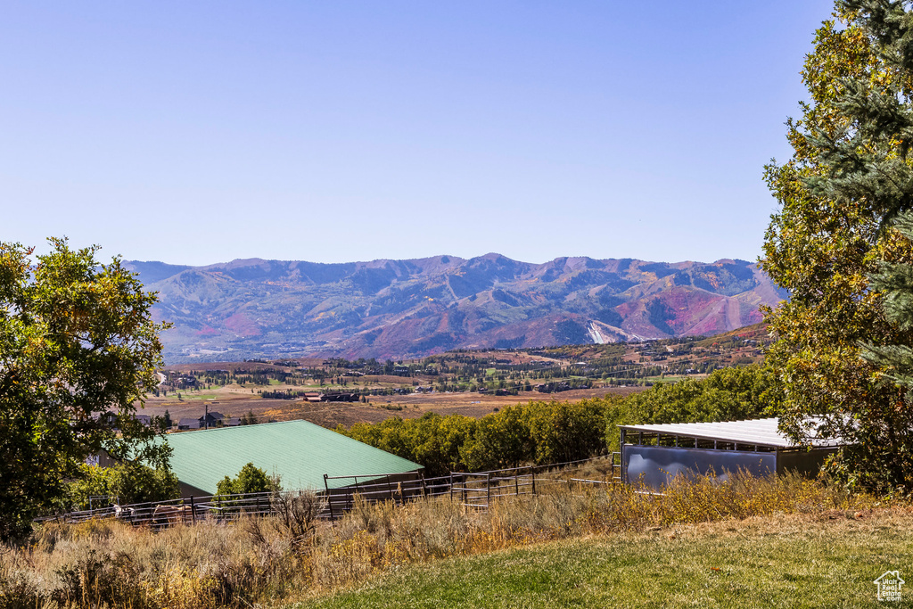 Property view of mountains with a rural view