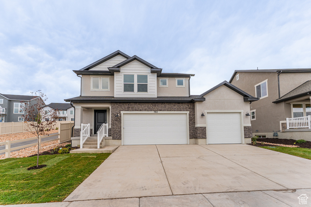 View of front of home with a garage