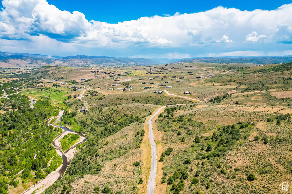 Birds eye view of property featuring a mountain view