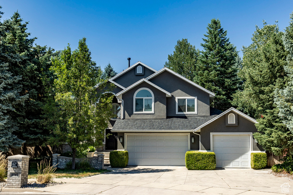 View of front facade with a garage