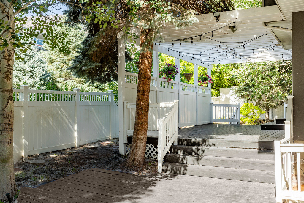 View of patio with a pergola and a wooden deck