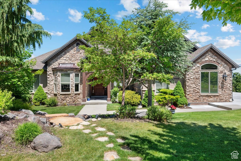 View of front of home with a front lawn