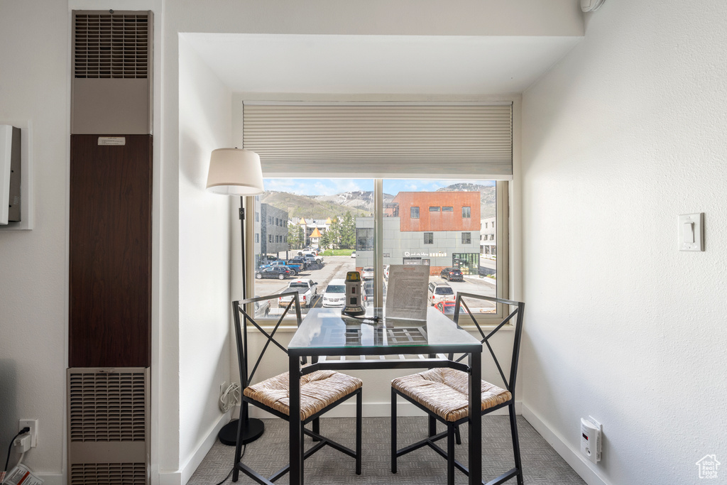 Dining space featuring carpet flooring