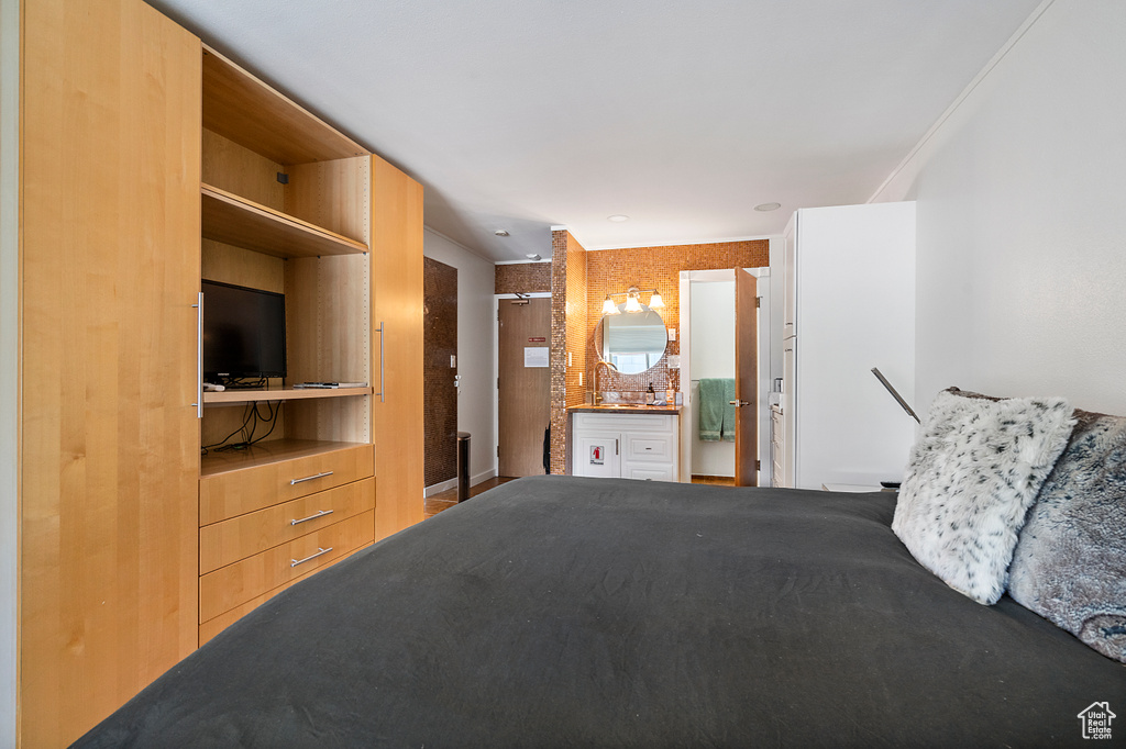 Unfurnished bedroom featuring connected bathroom