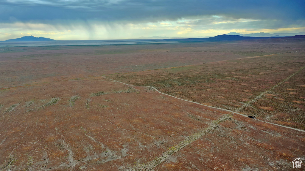 Birds eye view of property with a mountain view