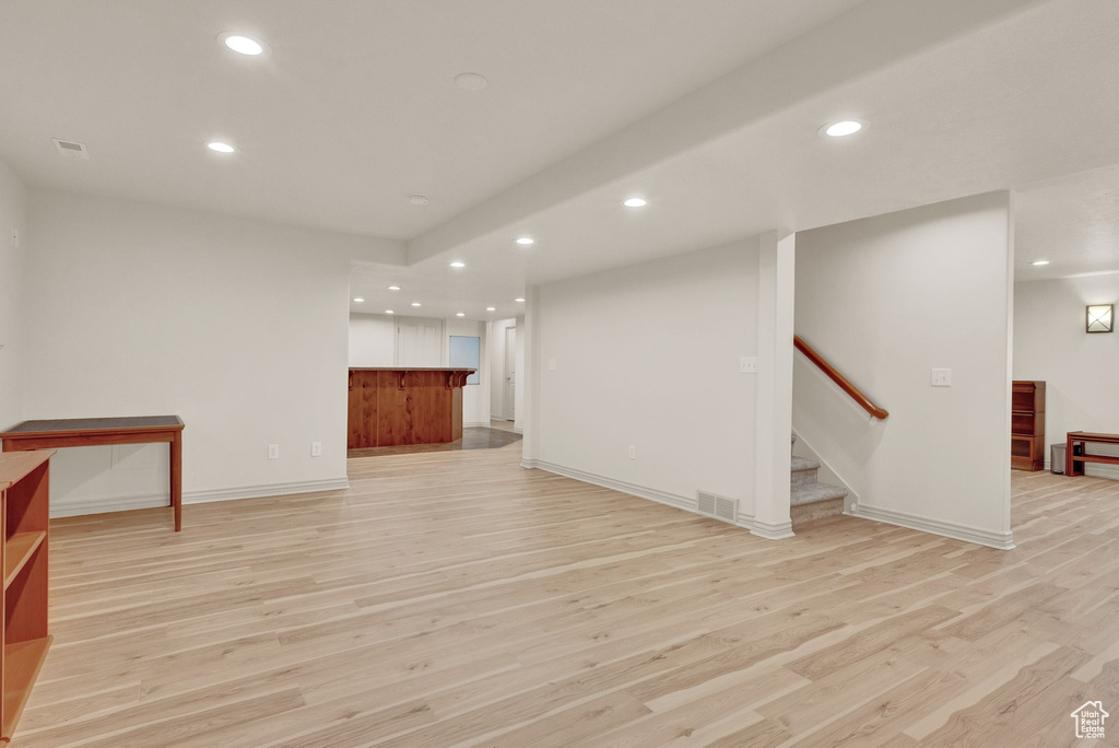 Living room with light wood-type flooring